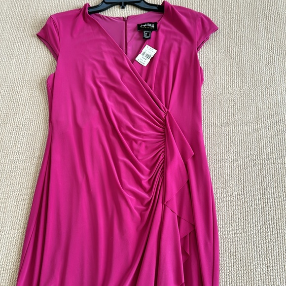 Dress hangs great. Never worn. Ruffles in front and bottom - Picture 2 of 9